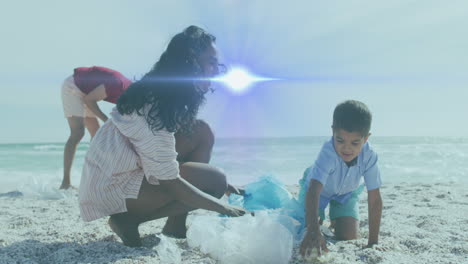 animación de luces sobre sonrientes padres hispanos y hijo recogiendo basura de la playa