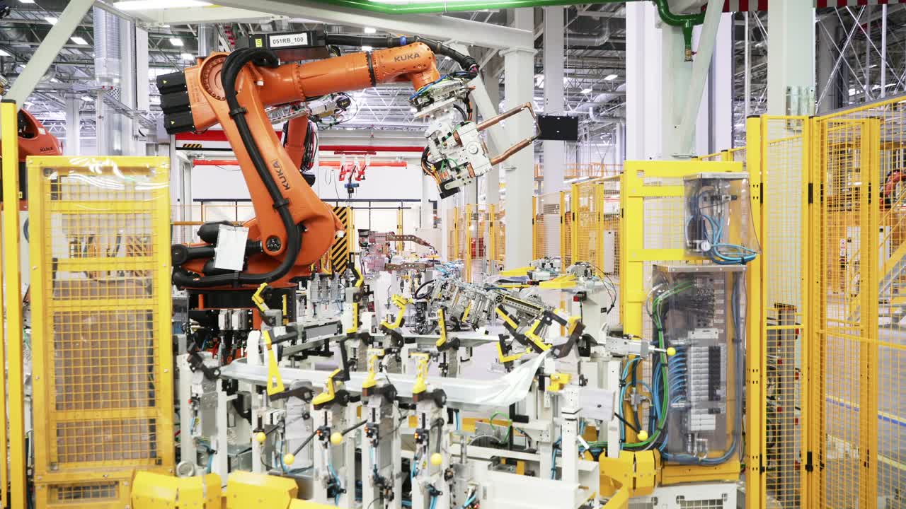 Automated car part assembly line in a factory