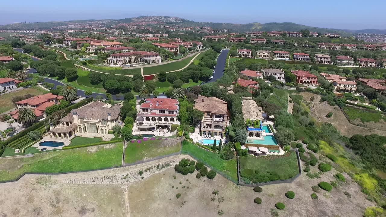 Slow motion aerial drone footage over Pelican Hill in Newport Beach, Orange County, California