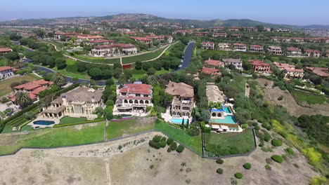 slow motion aerial drone footage over pelican hill in newport beach, orange county, california