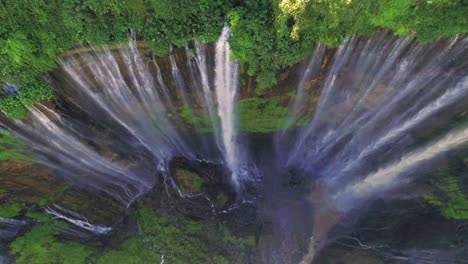 tumpak sewu rainbow waterfalls aerial scenic view timelapse capture, indonesia