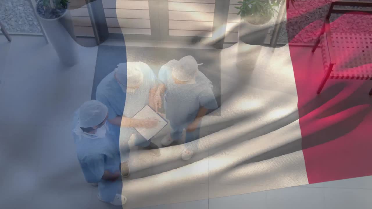 코로나바이러스 전염병 기간 동안 배경에 의료 종사자가 있는 프랑스 국기의 애니메이션