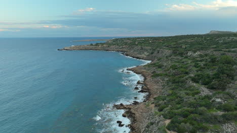 rocky konnos beach with waves of mediterranean sea in cyprus