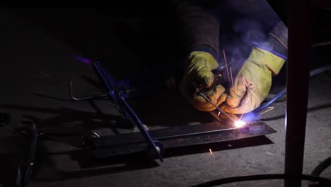 right angle jig being welded with angular precision, closeup