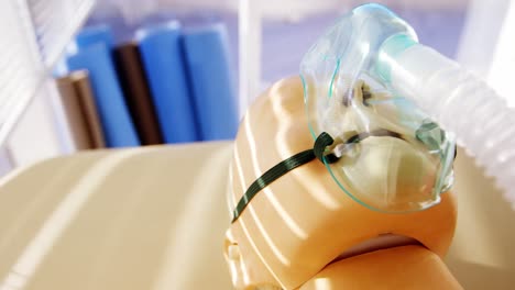 dummy patient simulated mannequin wearing oxygen mask