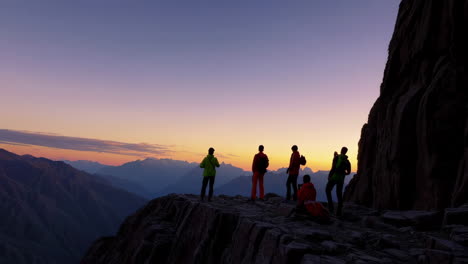 sunrise mountain viewpoint with hikers