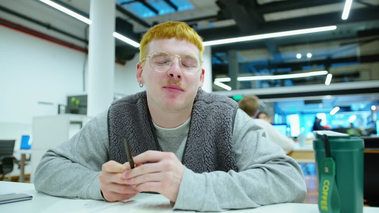 Young Gen Z Man Going Live or Video Calling in Office