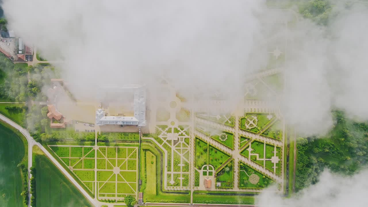 Clouds part to reveal elegant Baroque French garden geometry at Rundāle Palace