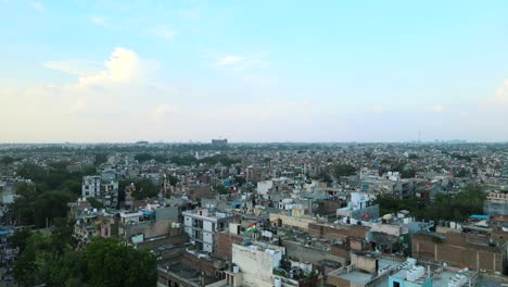 4K-Aerial-Shots-of-New-Delhi-Residential-Suburbs-on-a-beautiful-day-gliding-over-Rooftops,-streets,-parks-and-markets-in-India