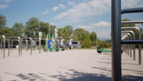 blurry scene of a parking area near a busy traffic road, static shot