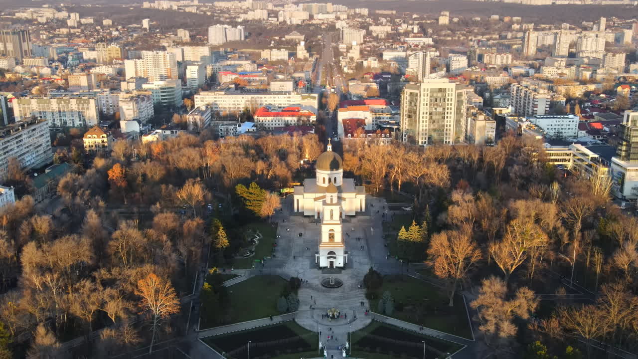 Aerial drone view of Chisinau downtown. Panorama view of central park with bare trees, catheral, buildings on the background. Moldova