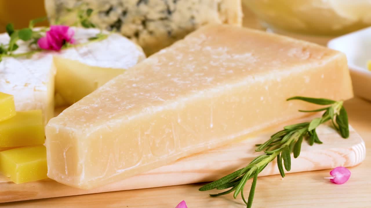 Assortment of Cheeses on a Wooden Board