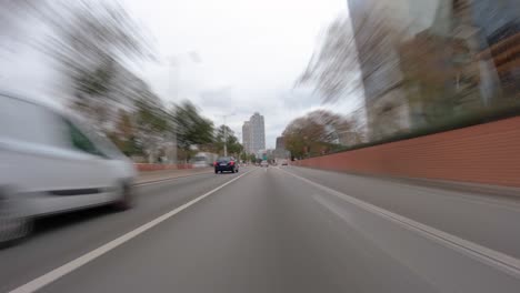 driving a car on the barcelona motorway highway in spain, fast camera mounted on the front ronda litoral