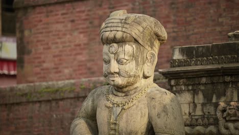 bhaktapur stone statue in a nepal temple, close up detail of statues in bhaktapur ancient city unesco world heritage site, a holy and sacred religious place popular as a tourist destination