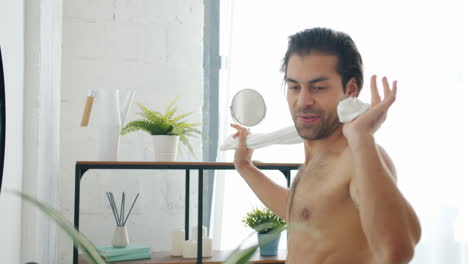 man drying off after shower