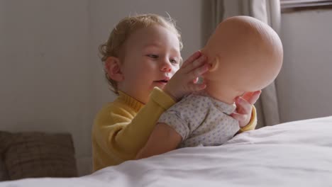 side view of caucasian baby at home