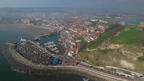 resort town of scarborough with scarborough castle, marina and scenic promenade in england, uk