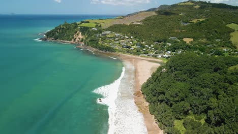 aerial flight over hot water beach in the coromandel peninsula of new zealand