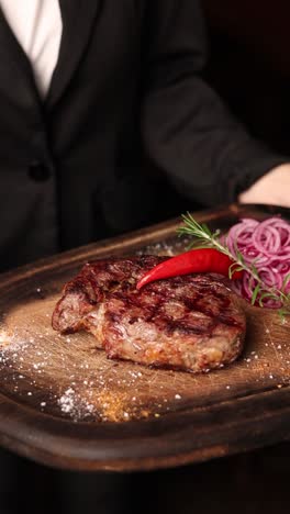 grilled steak with red onion and chili pepper