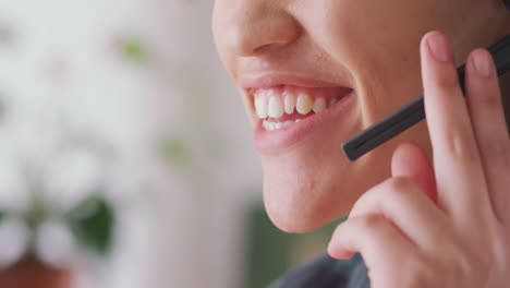 Close-up-view-of-woman-talking-through-headset-with-mix