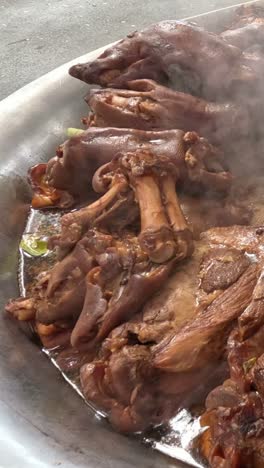 large pot of thai pork stew cooking.