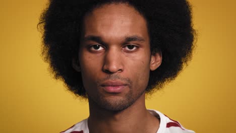 close up portrait of serious african young man in studio shot