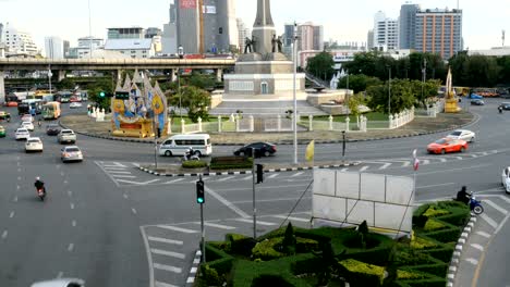 traffic at victory monument in bangkok, thailand.