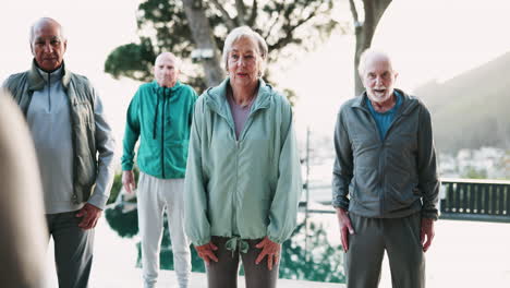 group of elderly people exercising outdoors