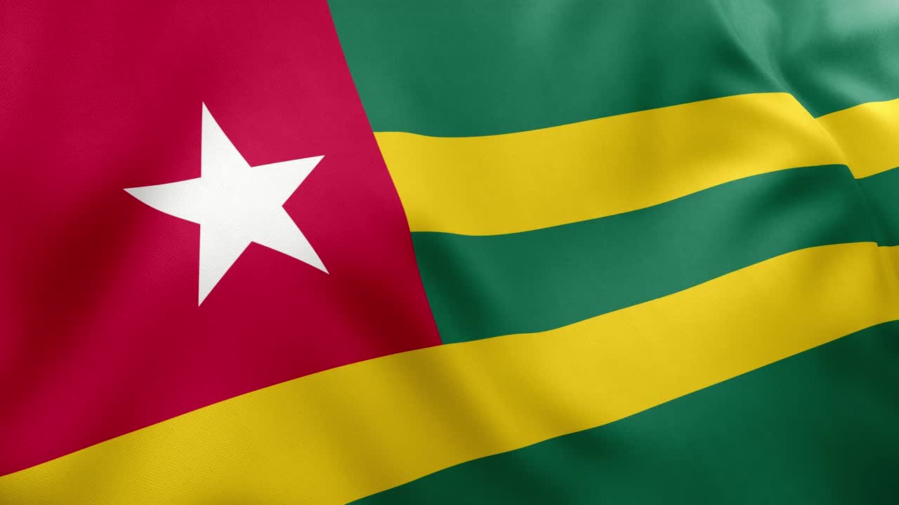 Realistic animation of Togolese national flag waving. Green yellow stripes red canton white star. Seamless loop for national themes Togo
