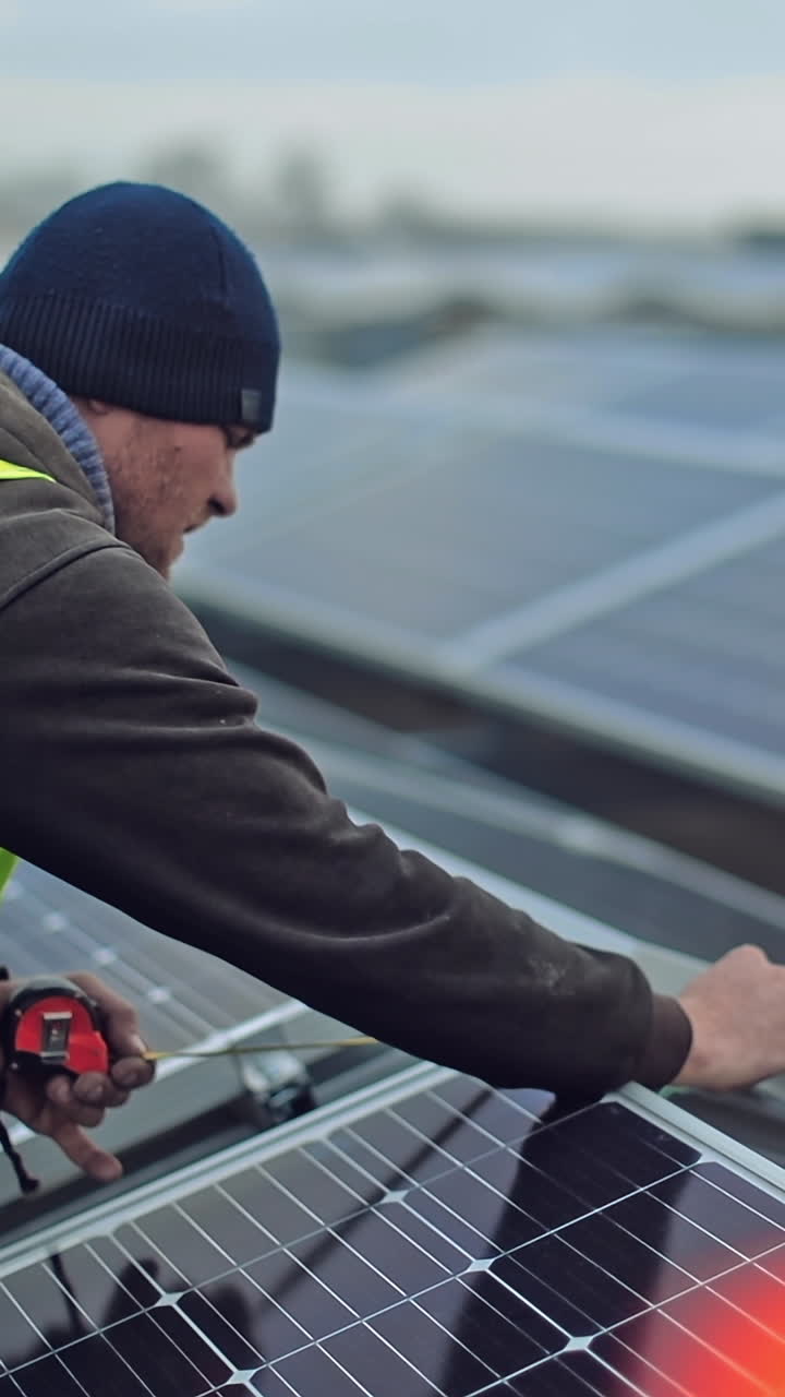 Installing solar photovoltaic panels. Professional engineer technicians installing solar panel to metal platform