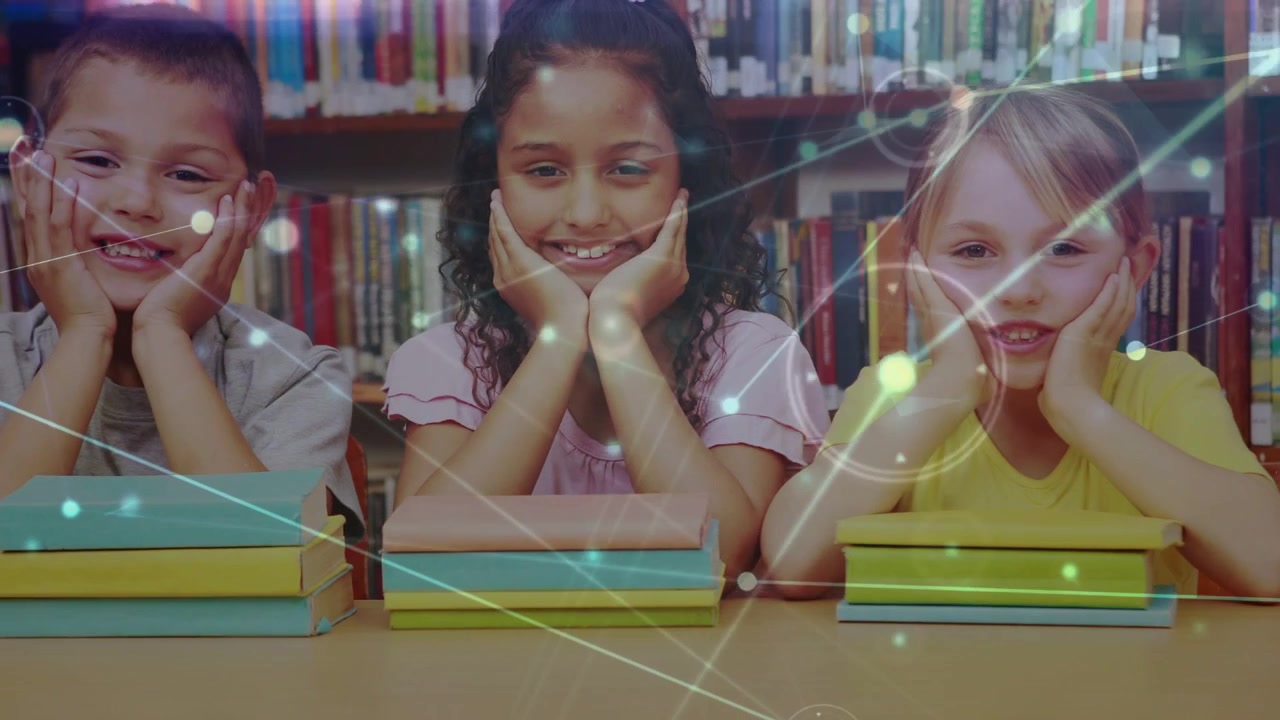 Three kids sitting at desk for group, camera zooming revealing third as nodes drifting across faces