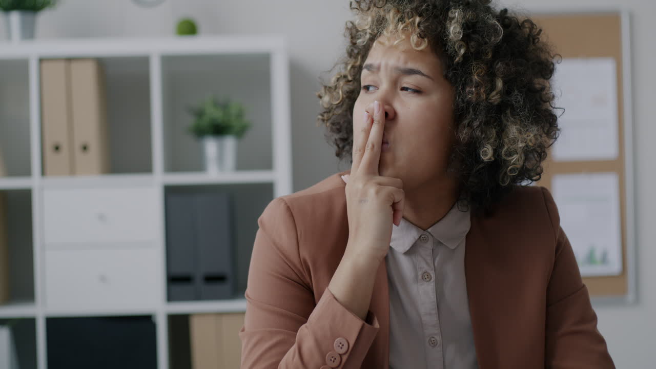 Woman Gesturing in Office
