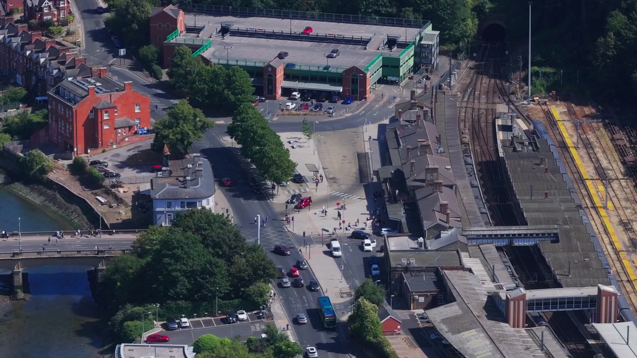 Tight circling aerial shot of the front facade of Ipswich station