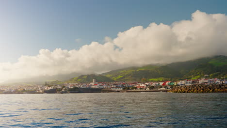 Picturesque-view-from-the-boat-of-the-beautiful-local-town-of-Vila-Franco-Do-Campo,-Sao-Miguel-island,-Azores---Portugal