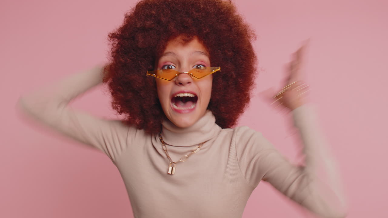 Young school girl screams from stress tension problems feels horror hopelessness fear surprise shock