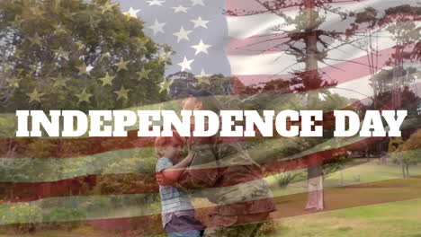animation of independence day text over caucasian soldier picking up happy son after returning home