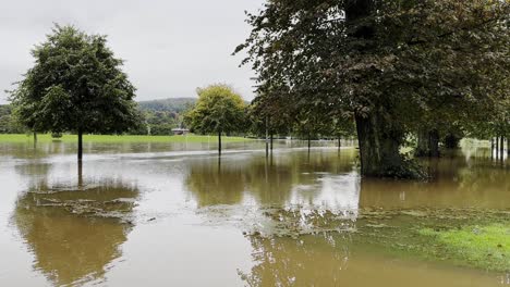 Walkways-being-submerged-under-water-during-tragic-floods-in-North-Inch-Park,-Perth