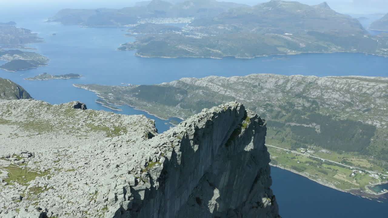 aerial footage of Hornhelen in Norway. This is an 860-meter tall cliff straight up from the fjords bellow