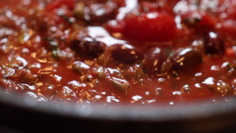 close up shot of italian food cooking in pan