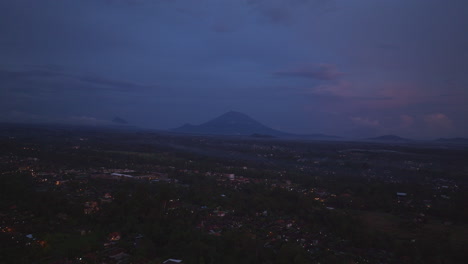 Ubud-village-with-houses-illuminated-at-sunset,-Bali-in-Indonesia