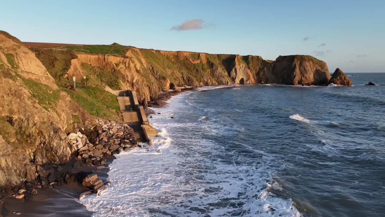 Ireland Epic Locations steps and coastal erosion drone pullback Waterford coast