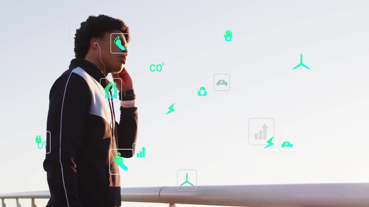 Man inserting earbud and activating AR icons displaying environmental and energy data by waterfront