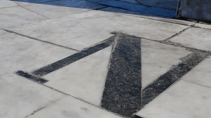 Sundial on marble. The shadow shows time