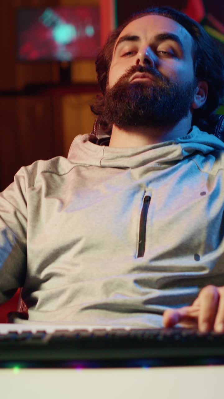 Vertical video Gamer trying to not fall asleep doing livestream with viewers all day