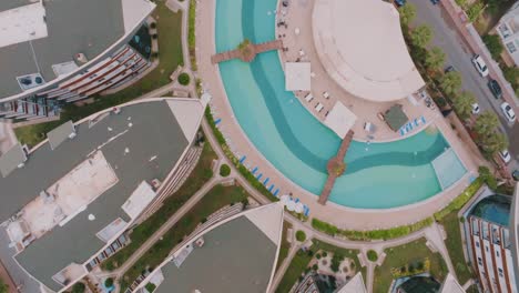 aerial view of a modern residential complex with swimming pool