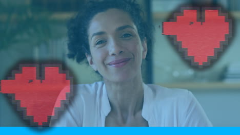 animación de iconos de corazón sobre una sonrisa de una doctora biracial