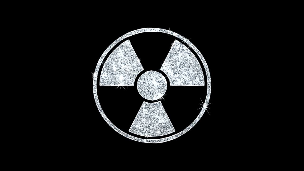 radioactividad nuclear icono de precaución brillante bucle de brillo partículas parpadeantes.