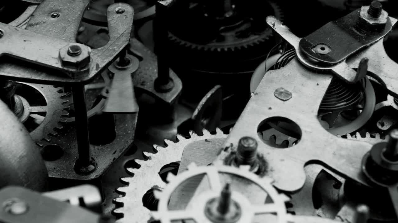 Watch mechanism macro loop. Old vintage clock mechanism working, closeup shot with soft focus. Close up of a internal clock mechanism. Vintage Watch Gears Movement Macro.