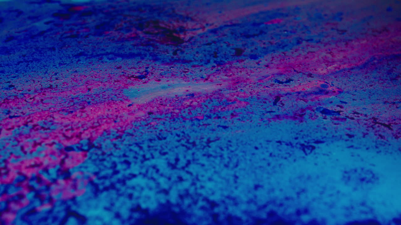 Colourful, organic, liquids macro shots buzzing and flowing