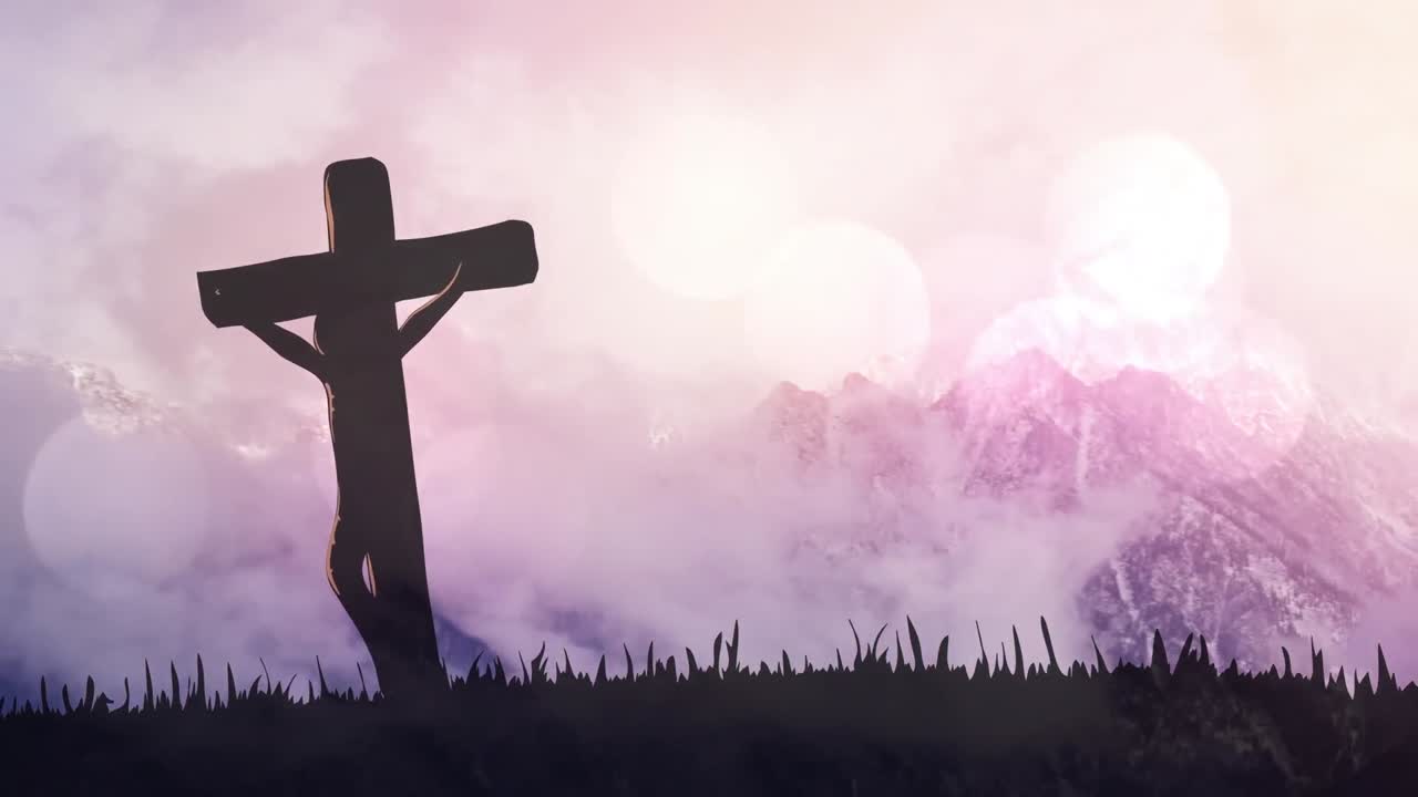 산 위에 검은 십자가 모양의 불빛의 비디오